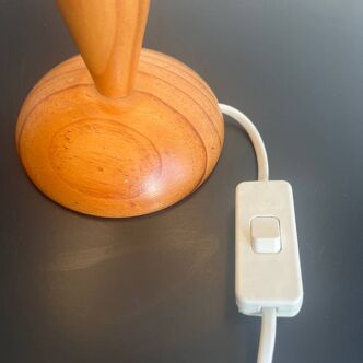 Table lamp with wooden base and velvet shade