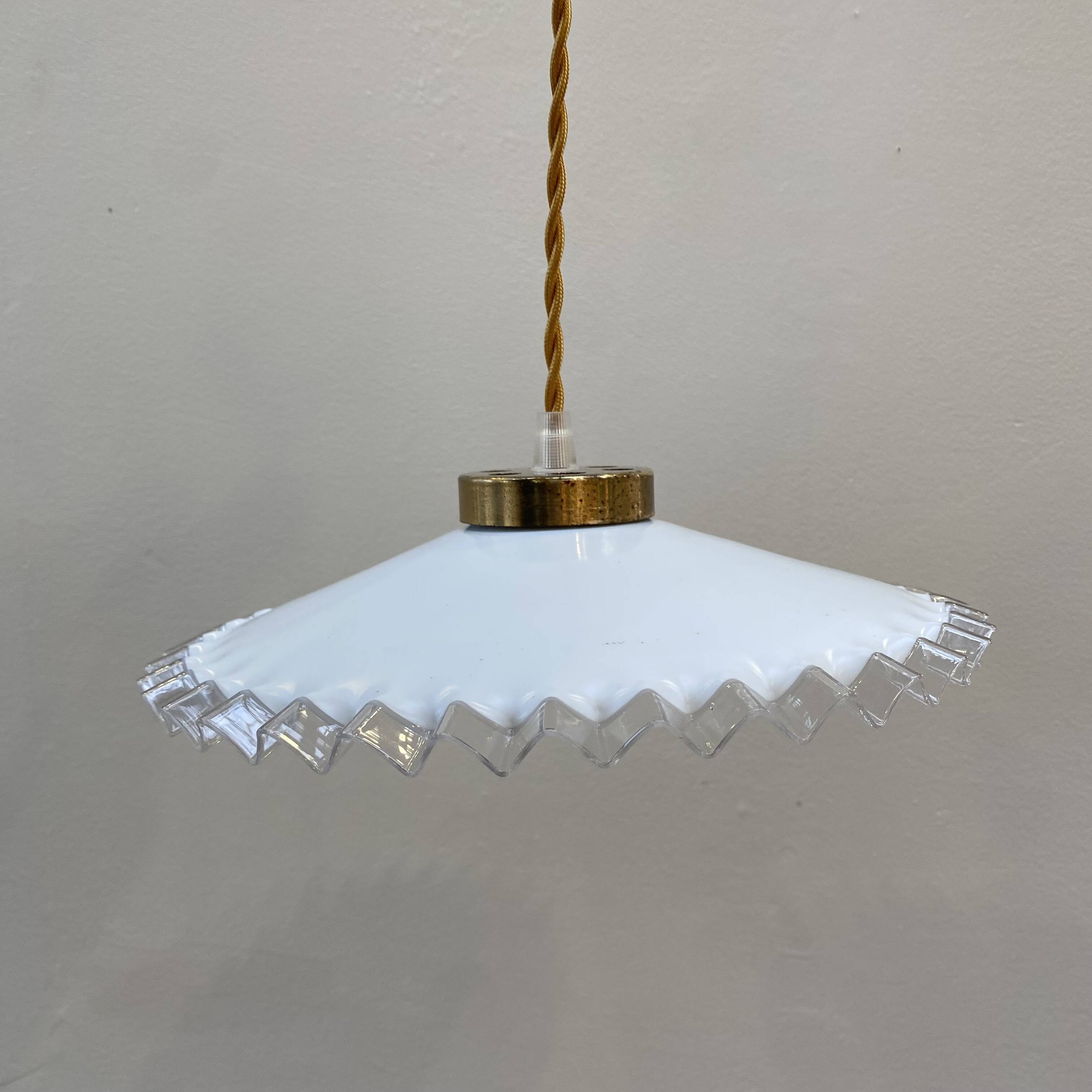 White opaline pendant light with transparent serrated edges