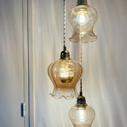 Triple vintage tulip pendant light in amber glass