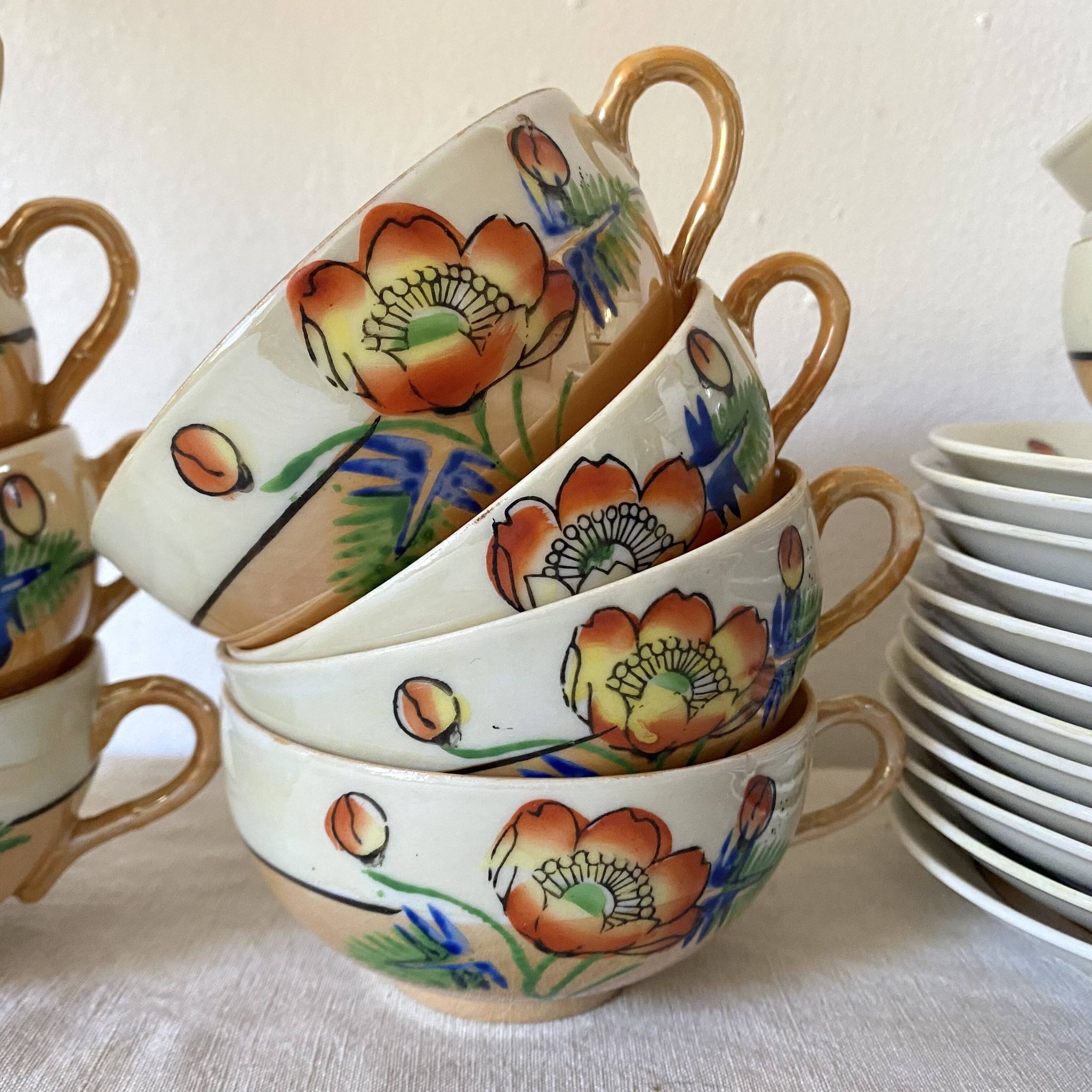 Fine mother-of-pearl and floral porcelain cups, Japan