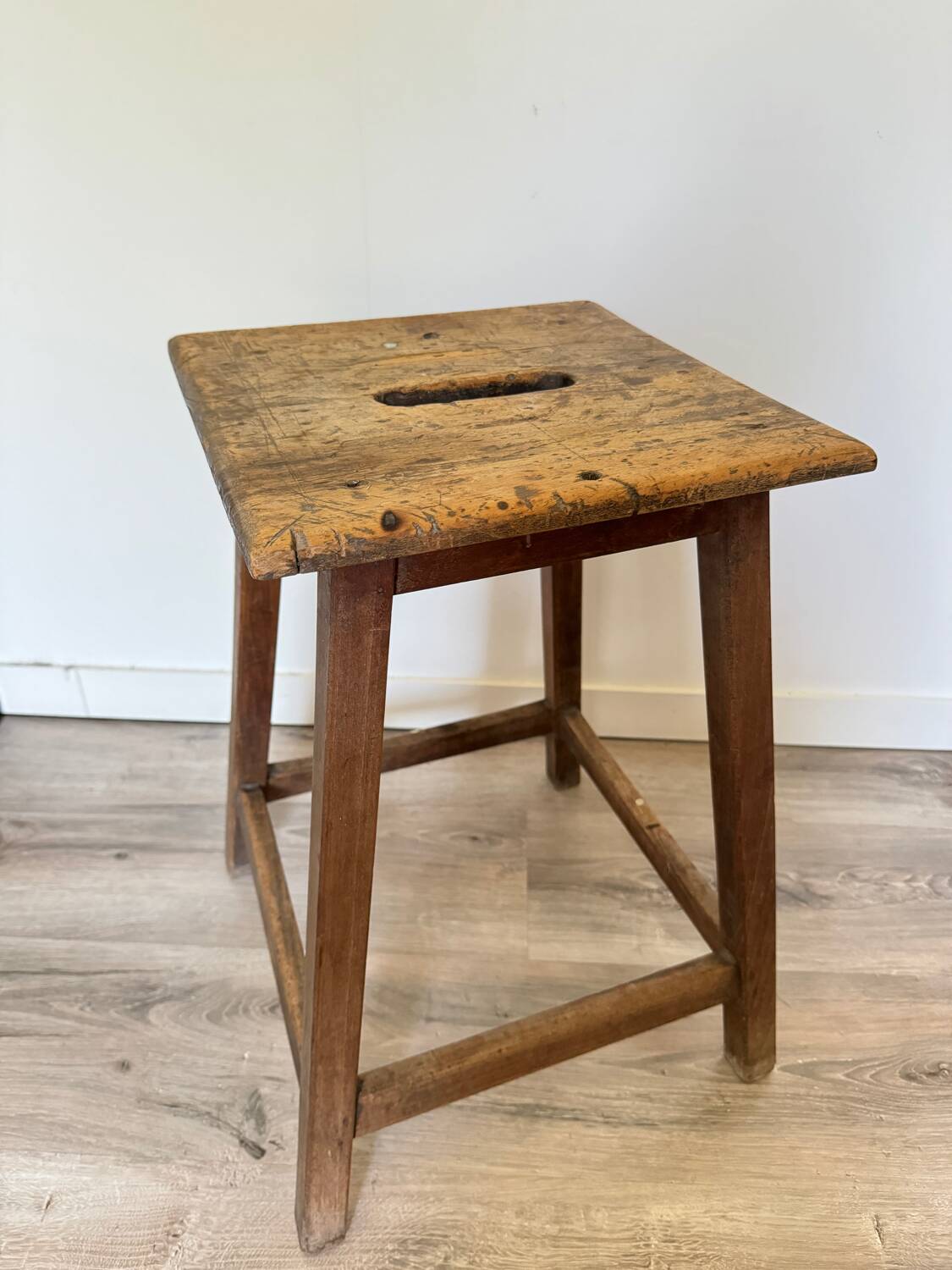 Old wooden painter's stool
