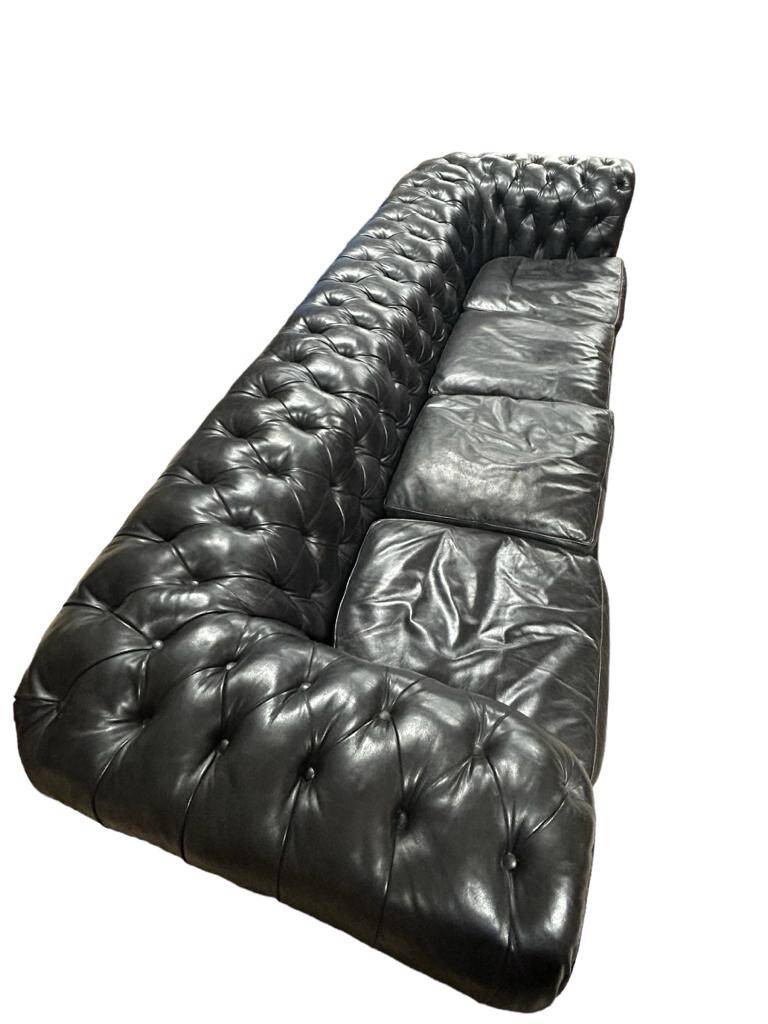 Large and old four-seater leather chesterfield sofa early 20th century l 260 cm