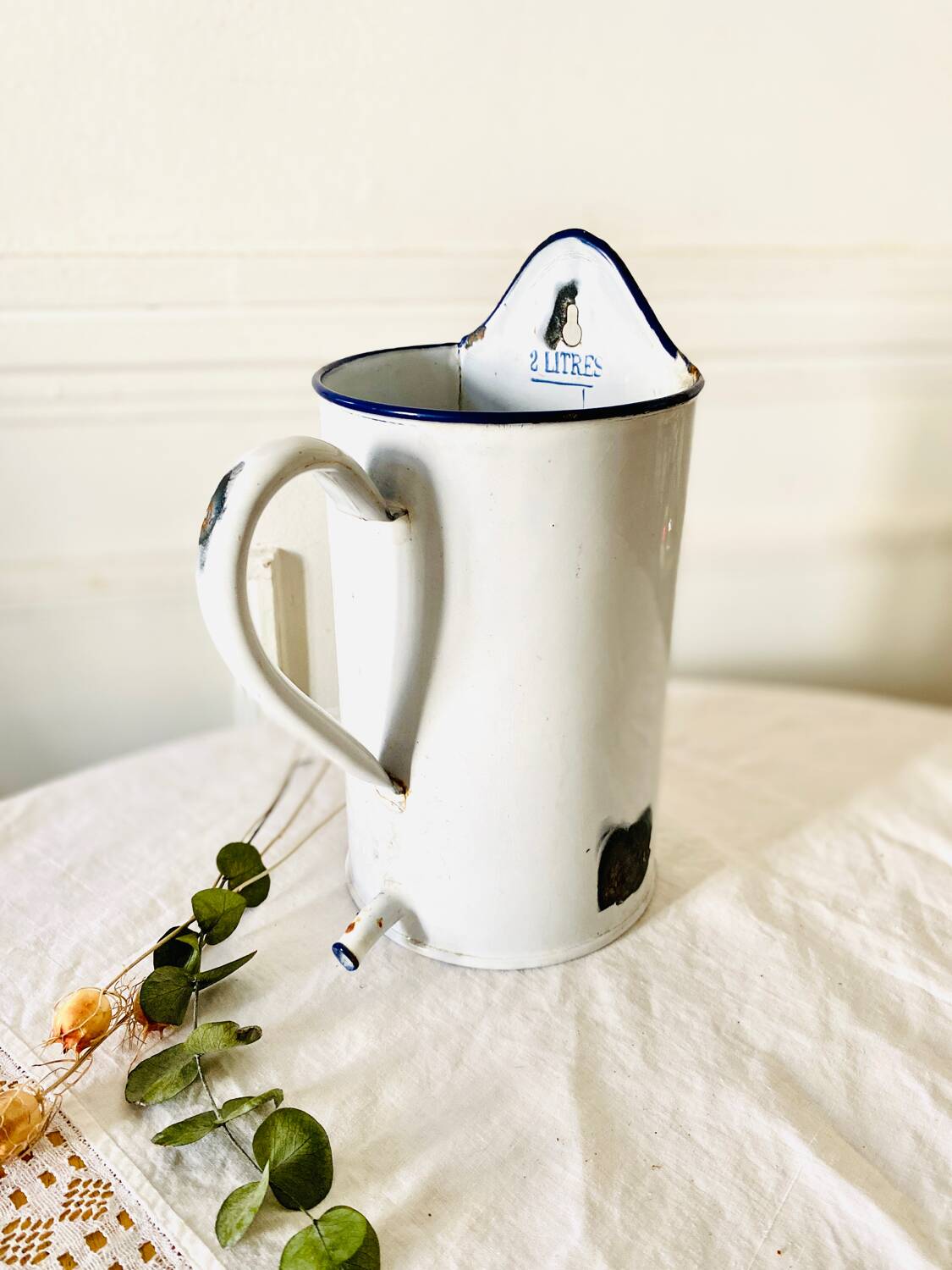 Old medical fountain in white enameled sheet metal