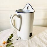 Old medical fountain in white enameled sheet metal