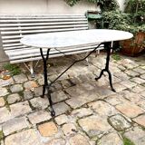 Oblong bistro table in grey marble and black cast iron