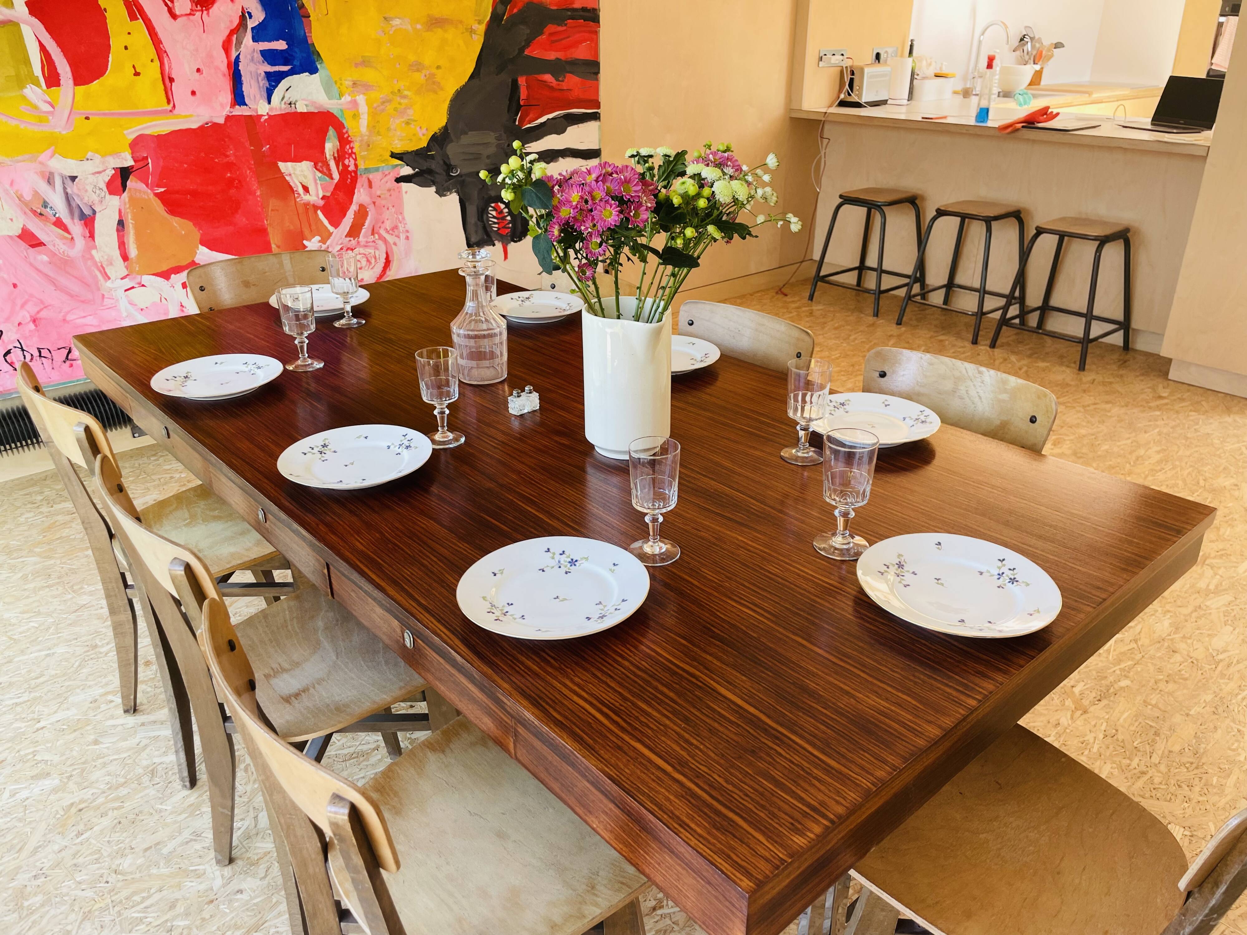 Desk that can serve as a dining table.