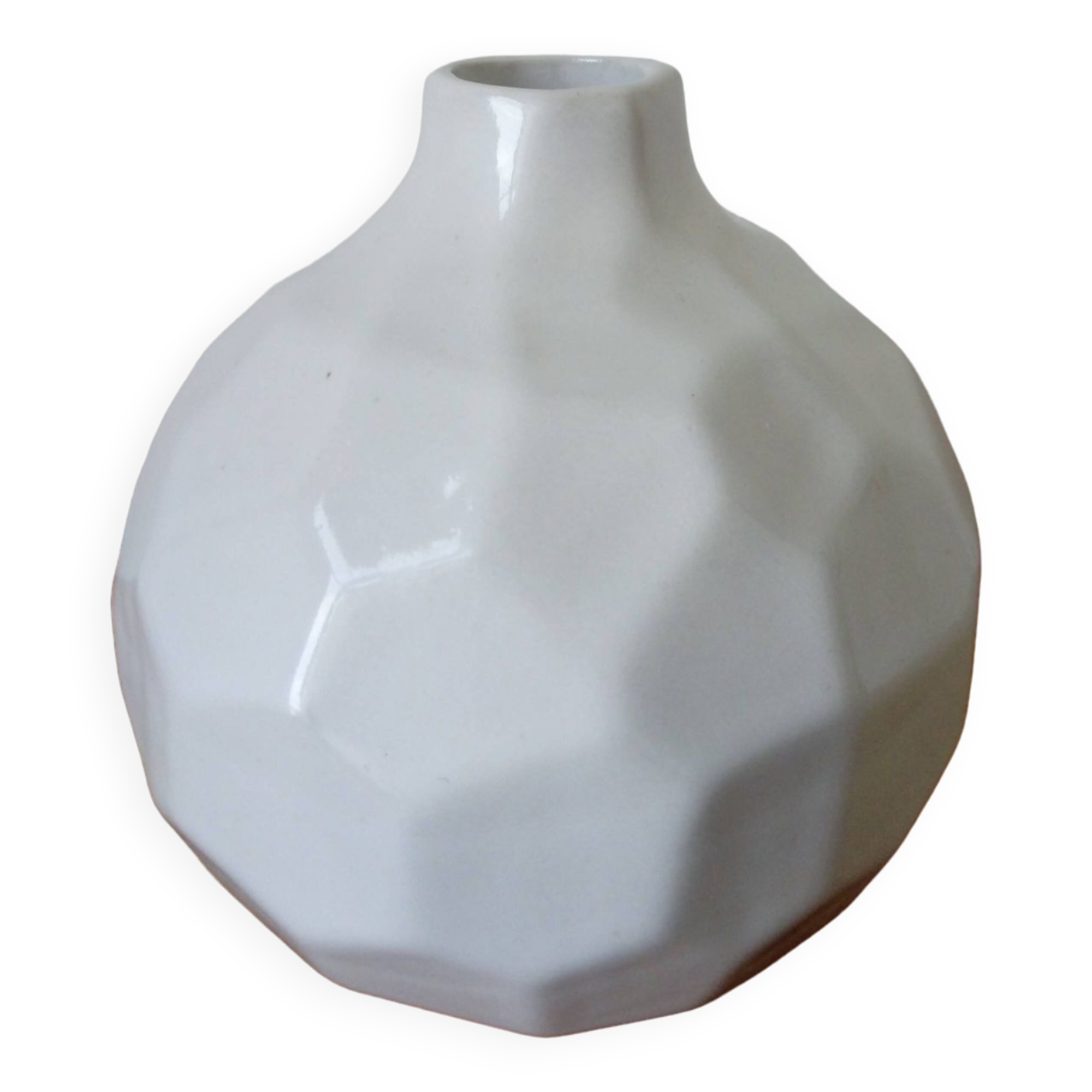 white ceramic faceted design vase