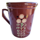 Enamelled clay pitcher