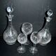 Baccarat set of 35 crystal glasses + 2 flower model carafes 9157 from 1907
