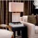 Pair of table lamps in sandstone and brushed brass