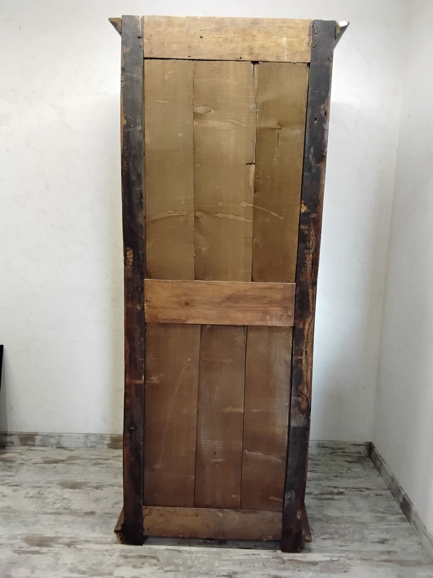 Antique wardrobe standing man