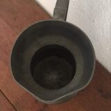 Stamped pewter pitcher