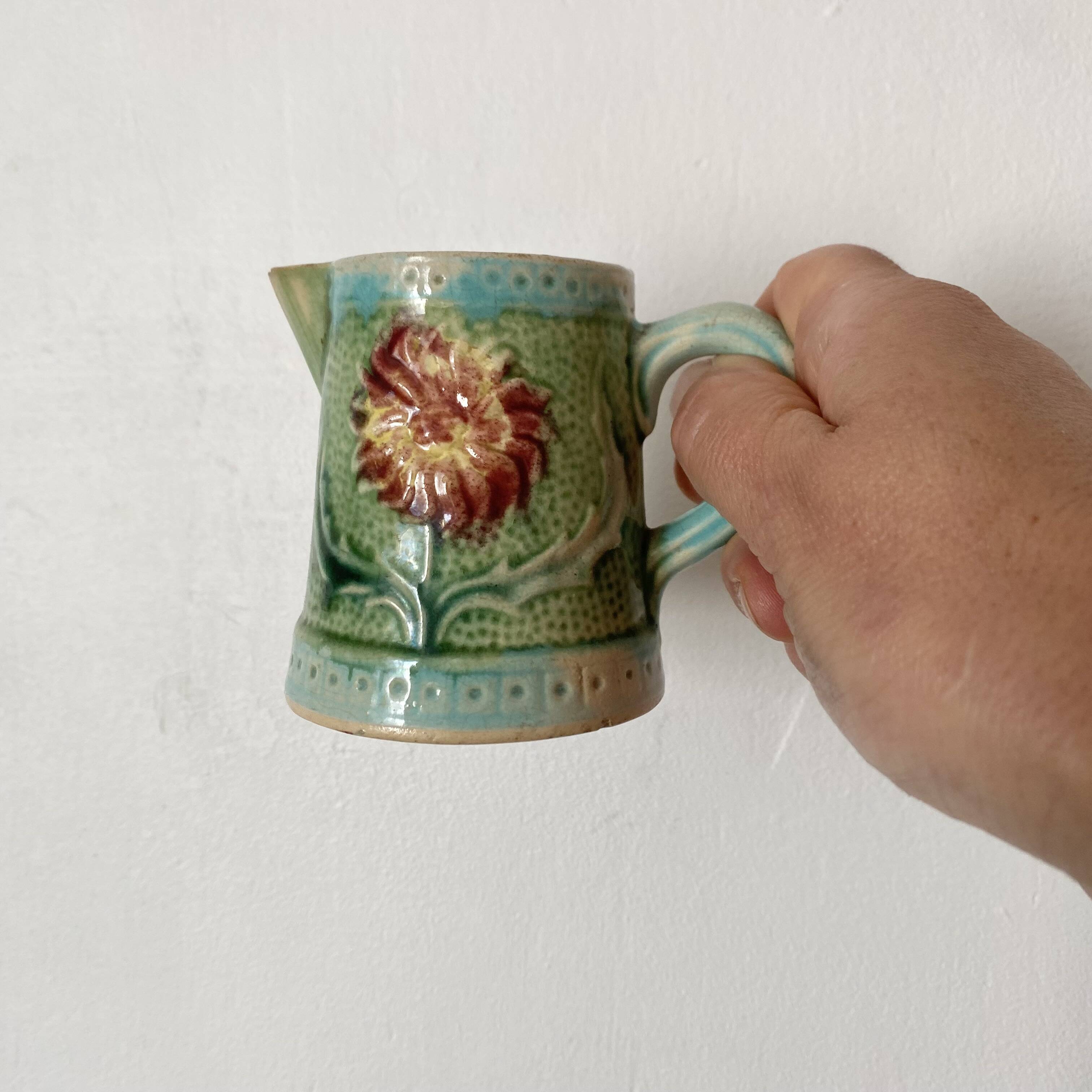 Small Art Nouveau slip milk pitcher
