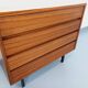 Vintage Scandinavian modernist chest of drawers in rosewood and black metal.