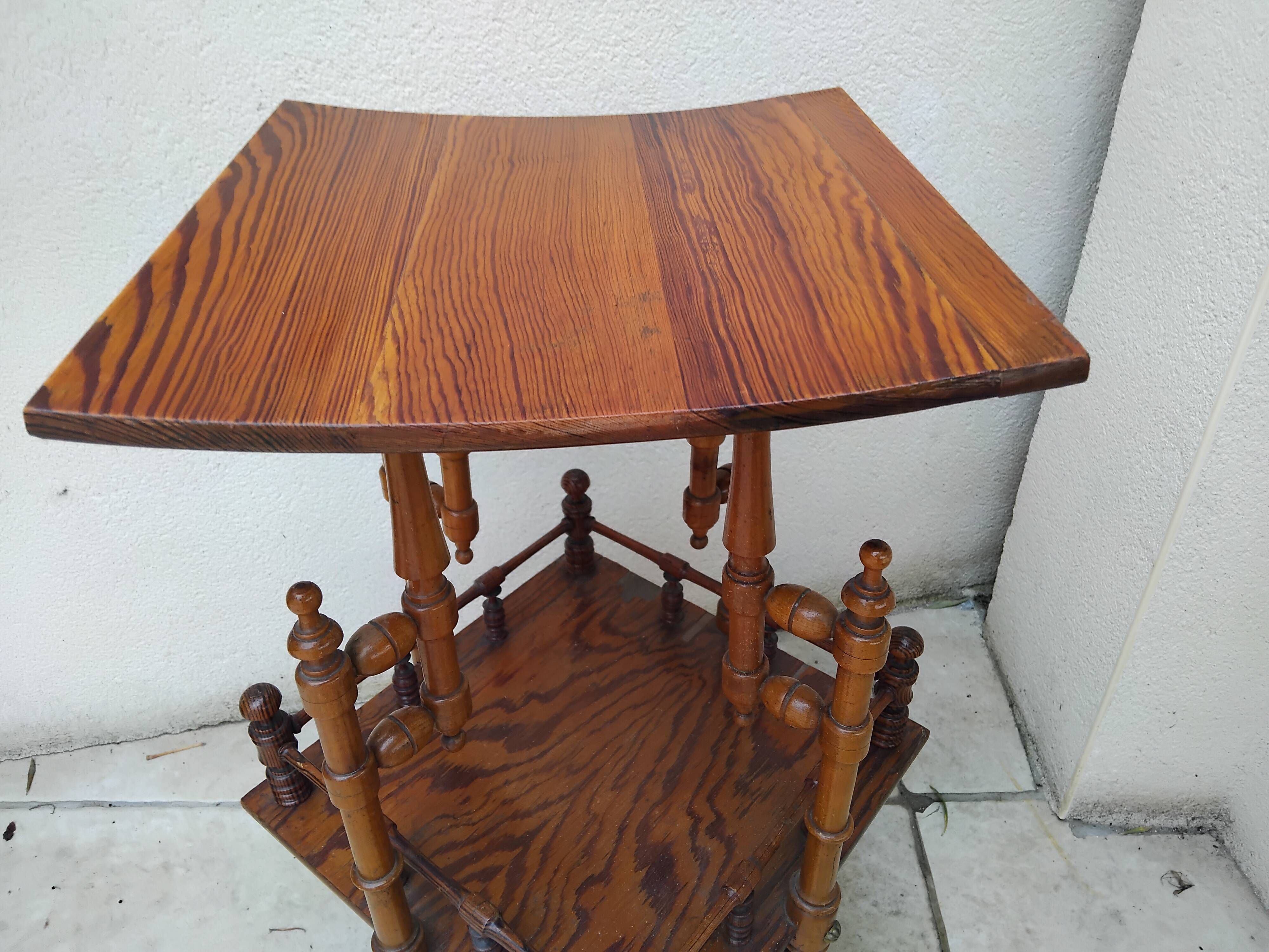 Antique pedestal table in Asian Japonese style.