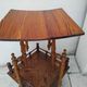 Antique pedestal table in Asian Japonese style.