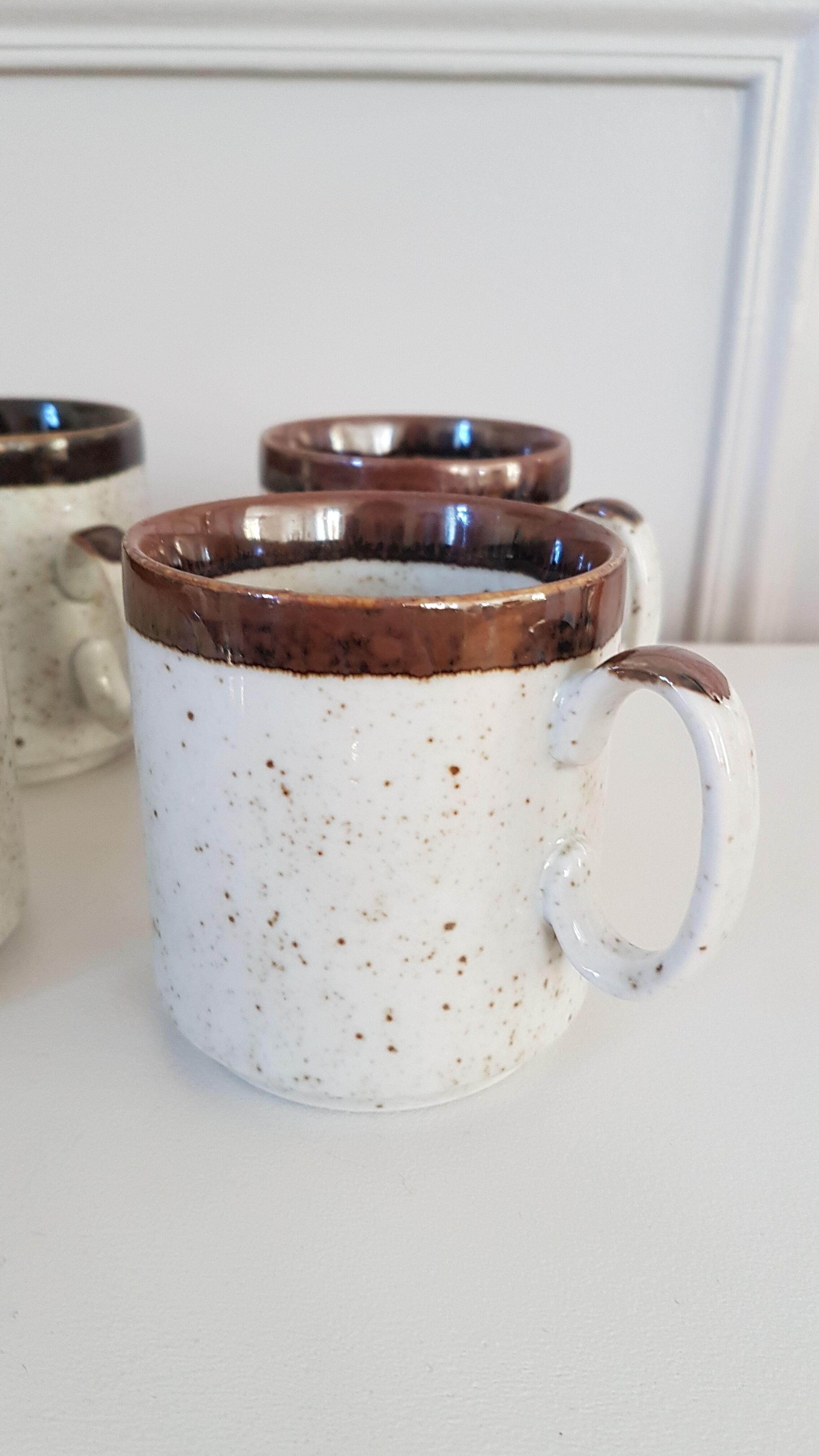 Six stoneware mugs