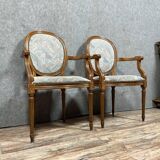 Pair of Louis XVI armchairs with medallion backs circa 1940