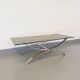 Vintage glass and chromed metal coffee table from the 70s