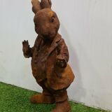 Rabbit with a cast iron pipe garden statue