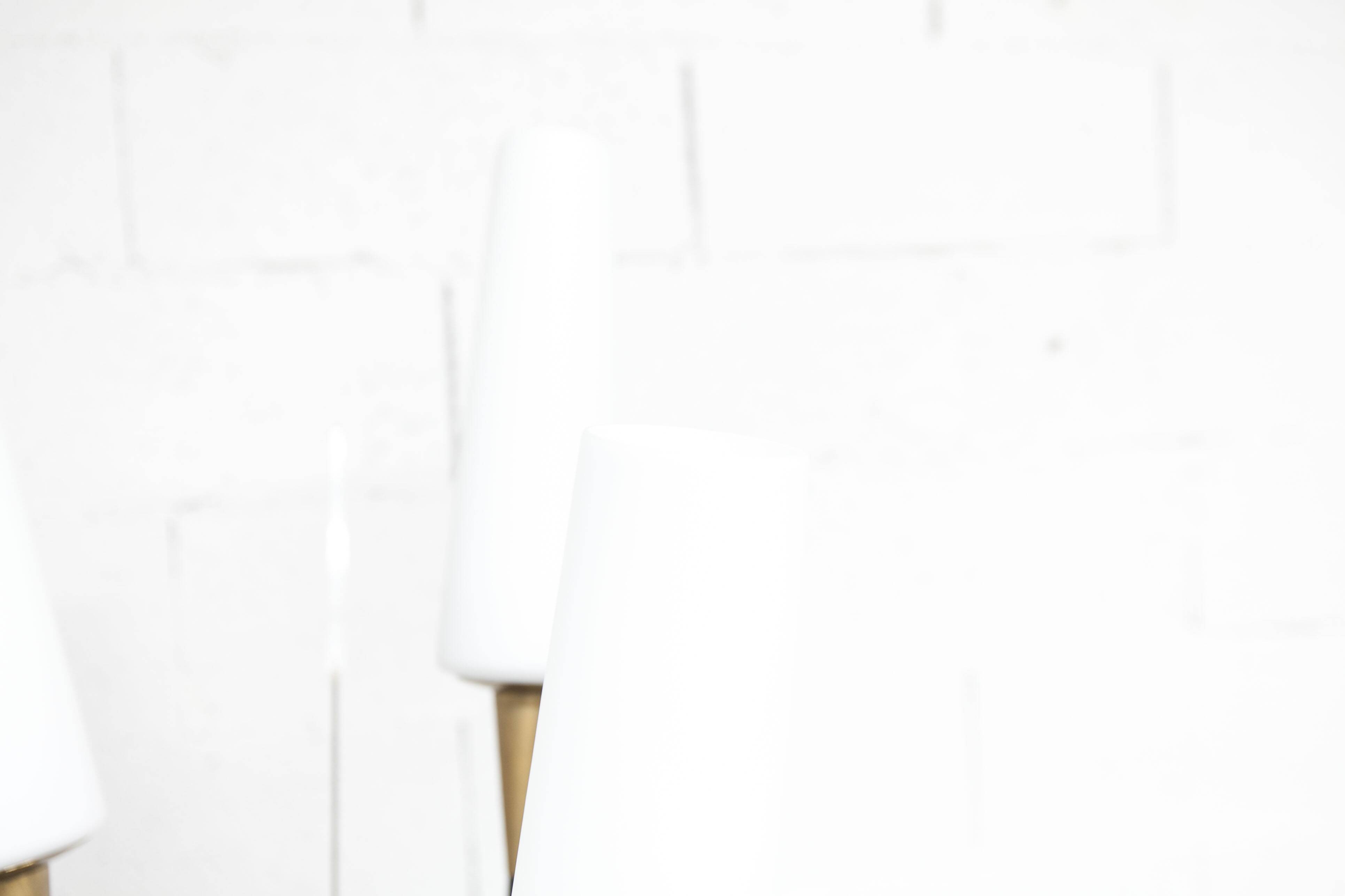 Floor lamp by René Mathieu for Maison Lunel 1950, brass and opaline.