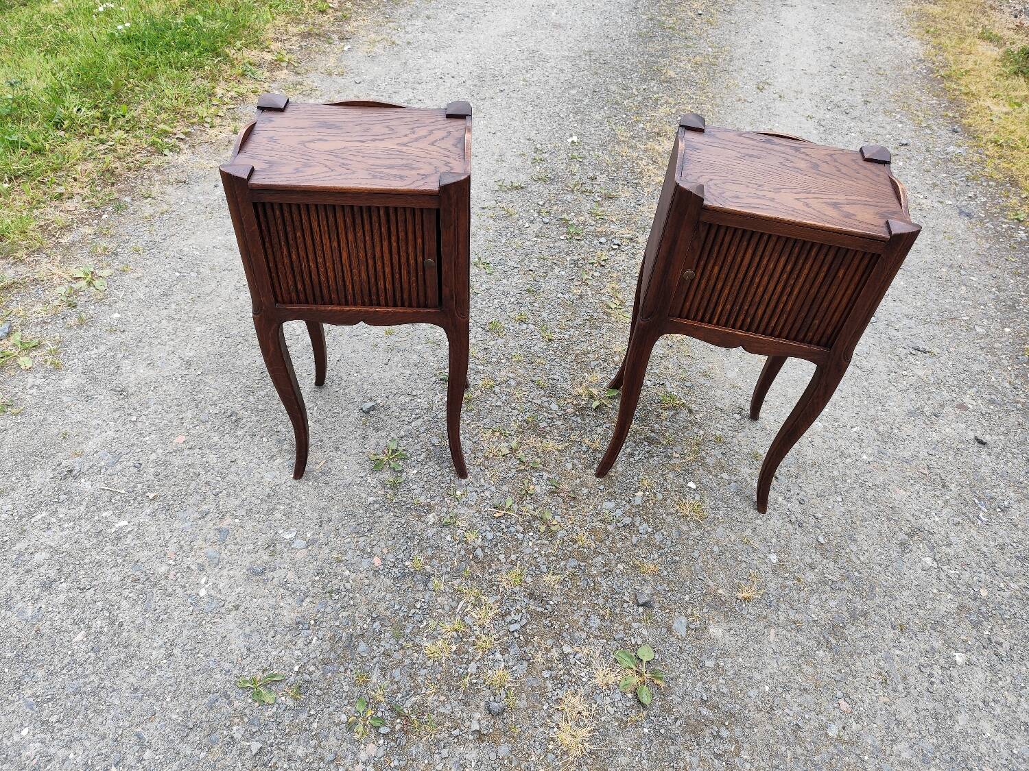 Pair of oak bedside tables with curtained niche doors