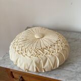 Cushion in beige fabric