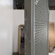 Louis XVI style caned screen with a re-champis finish.
