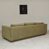 Pierre Frey modernist bench in green and gold patterned fabric