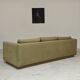 Pierre Frey modernist bench in green and gold patterned fabric
