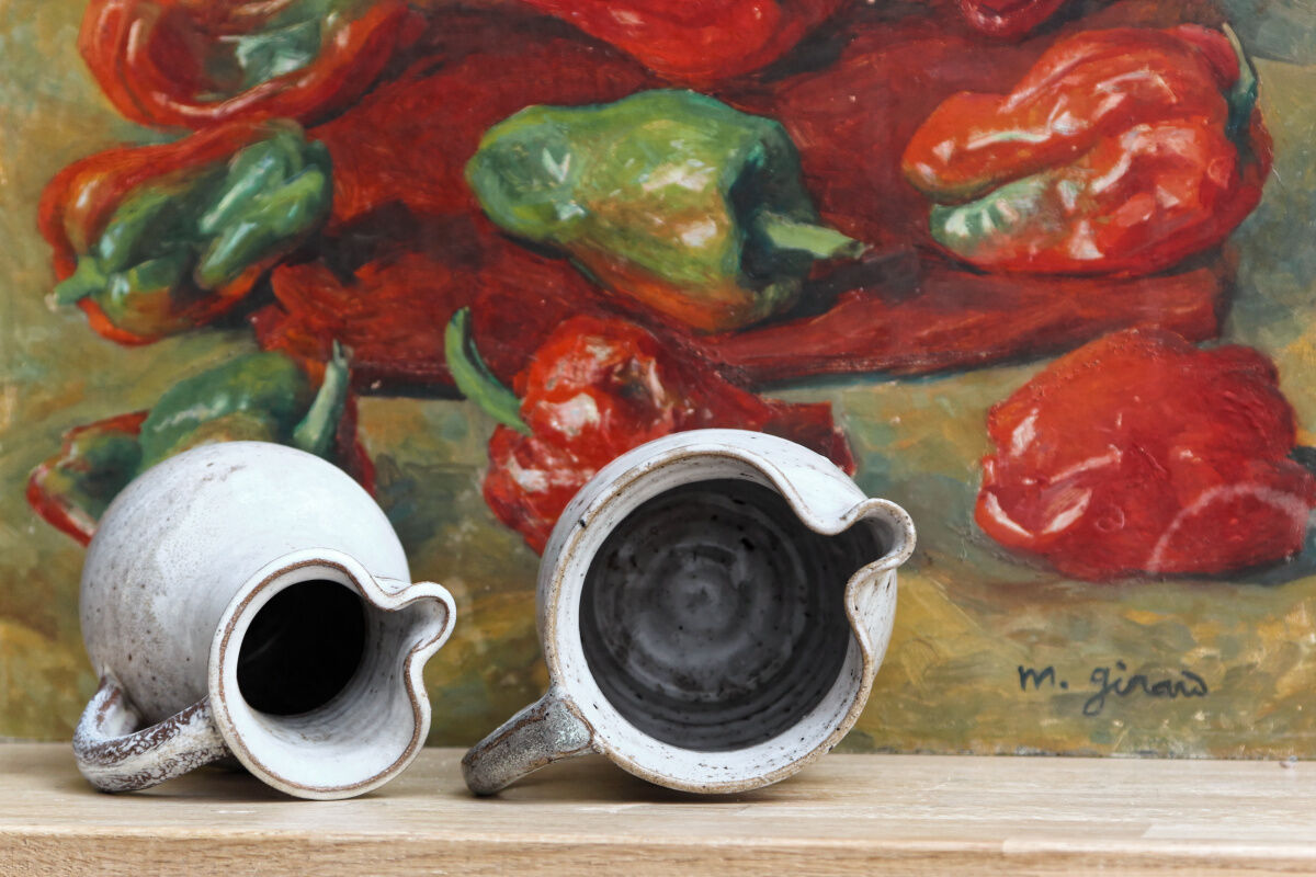 Pair of glazed terracotta pitchers