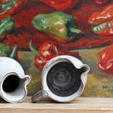 Pair of glazed terracotta pitchers