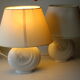 2 bedside lamps made of white ceramic with floral motifs and fabric lampshades, vintage from the 70s