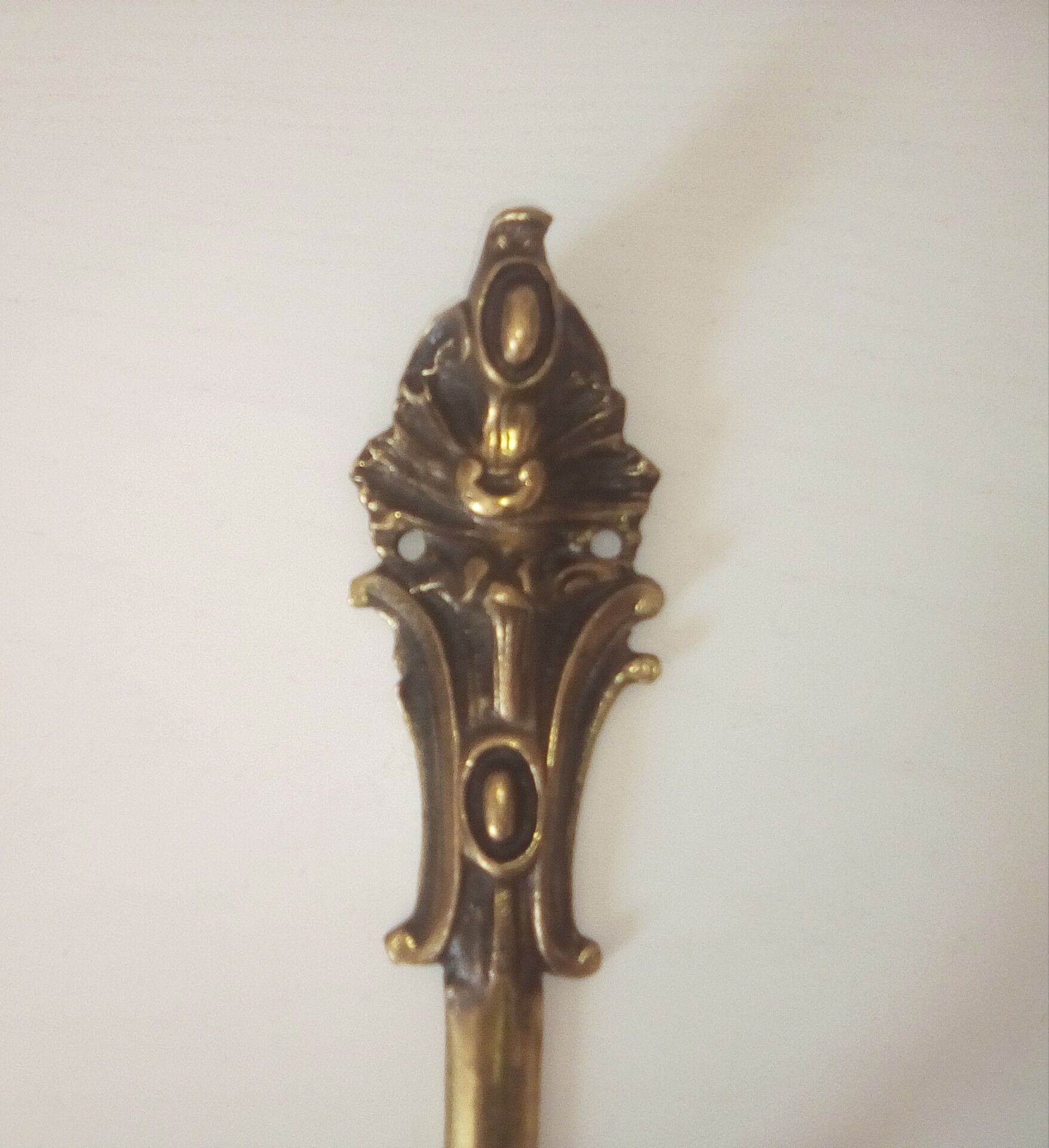 Old brass coat rack hook