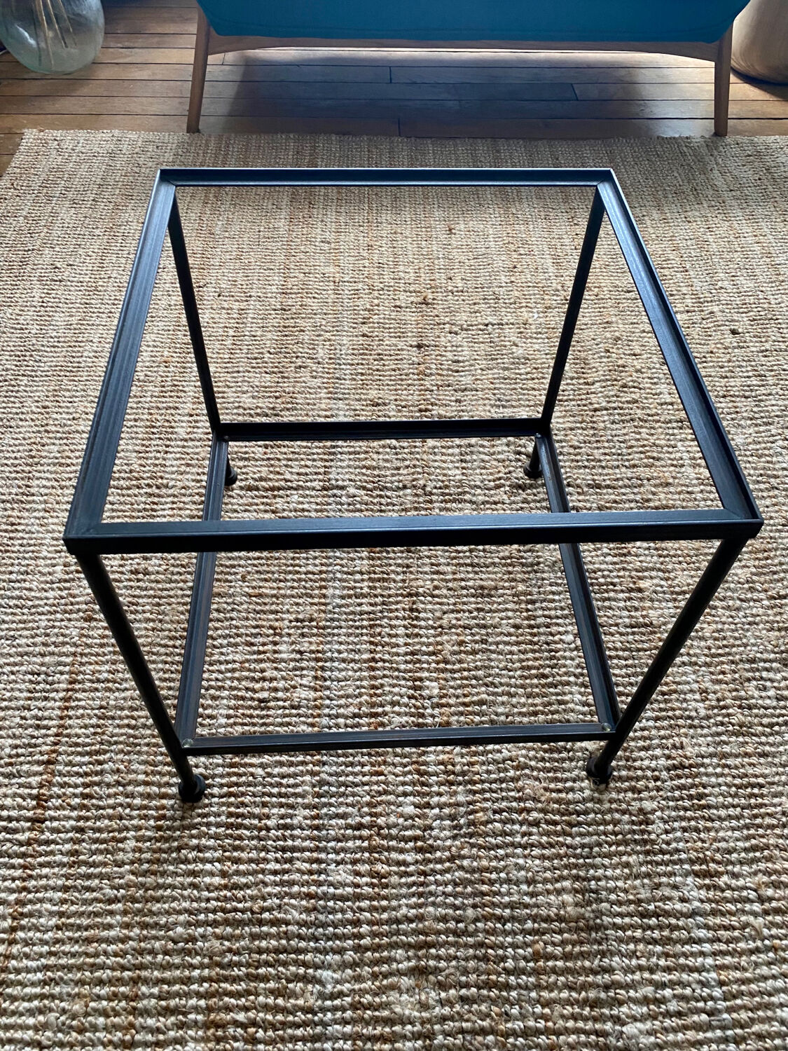 Glass and wrought iron coffee table design