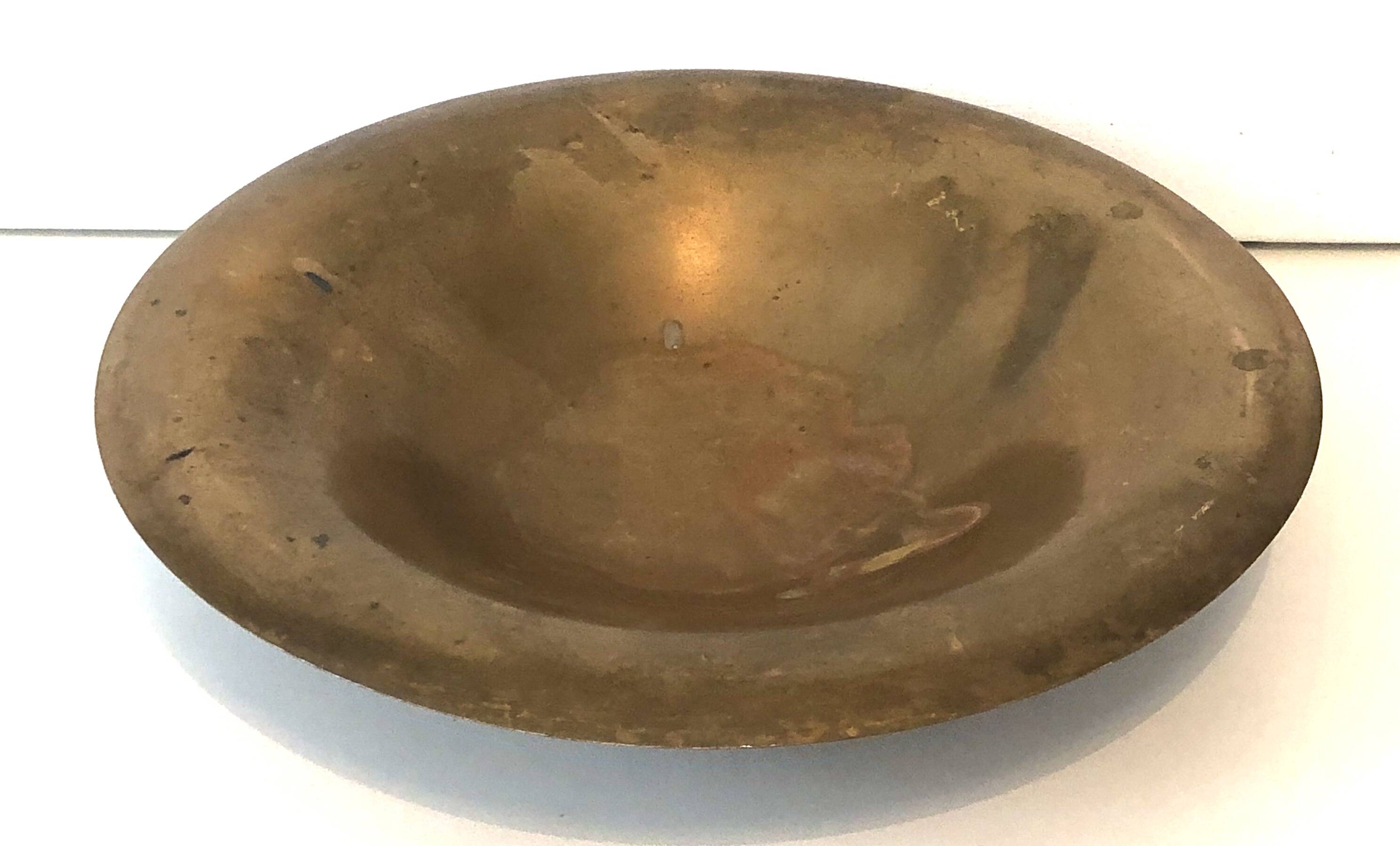 Old golden brass fruit bowl