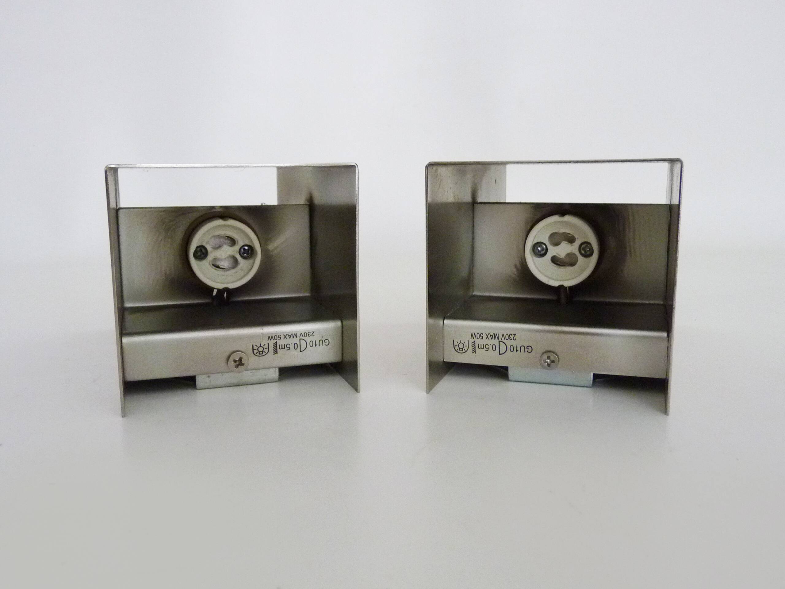 Pair of vintage chrome wall lights in Massive stainless steel