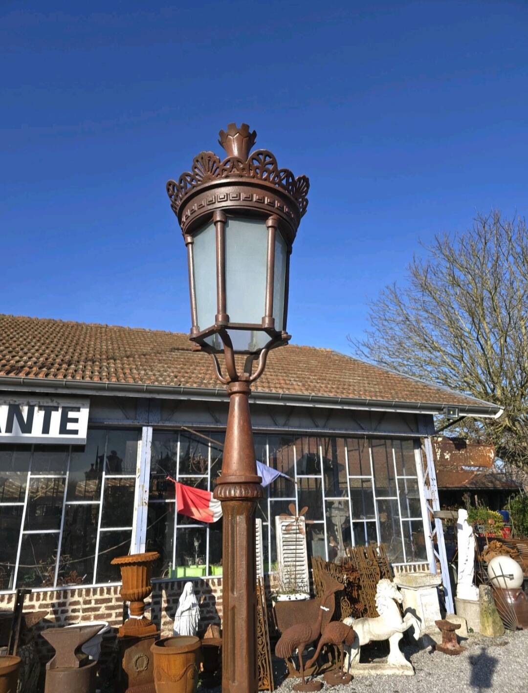 Cast iron street lamp with a lantern