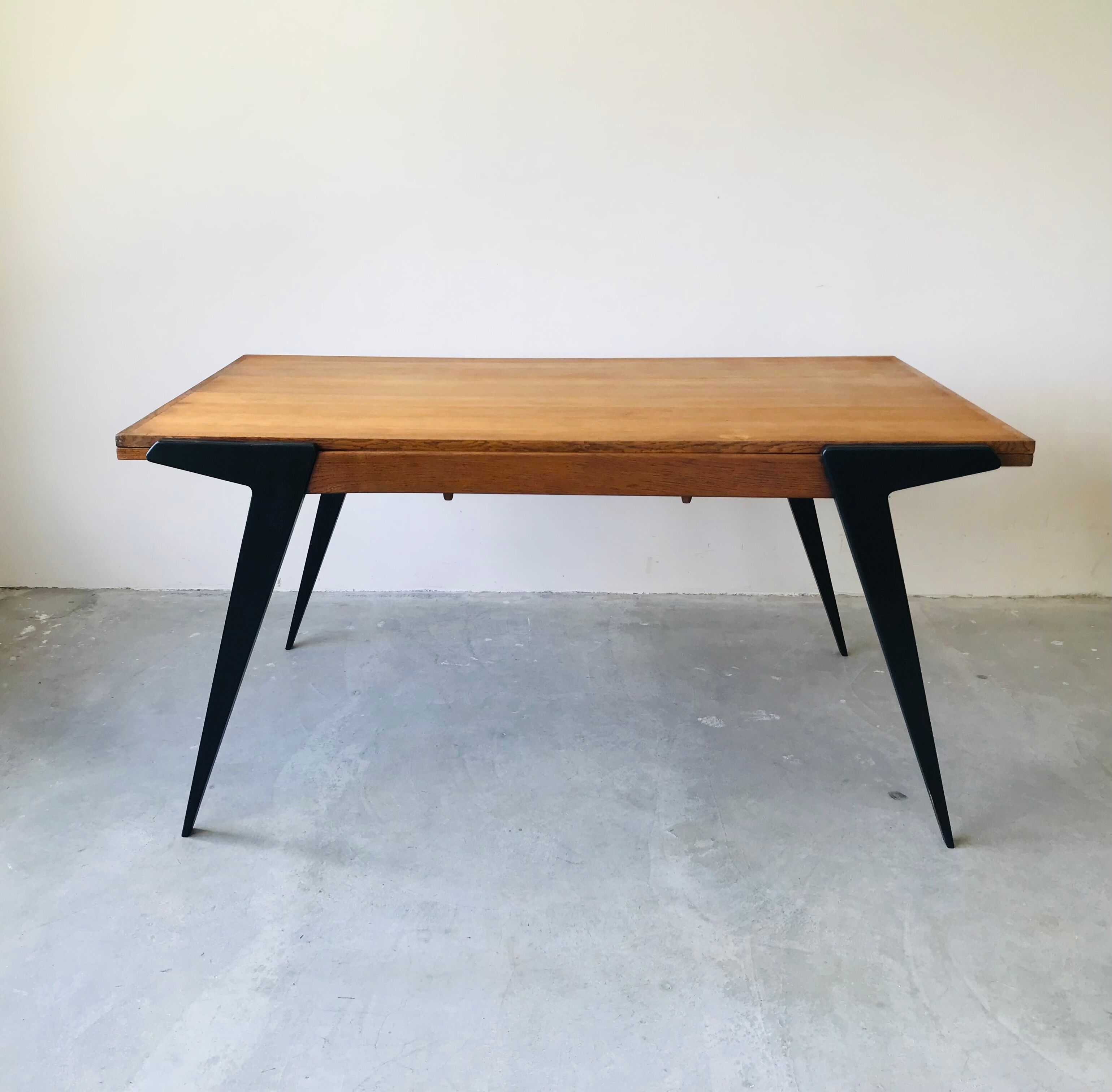 Extendable dining room table, circa 1950