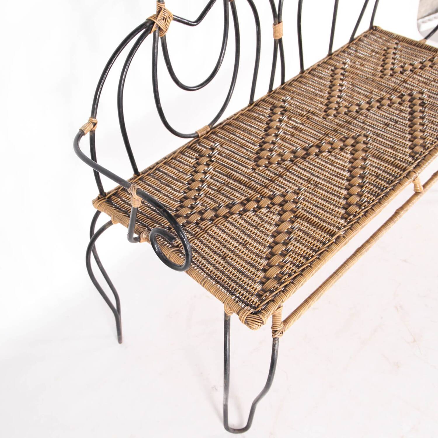 Iron and rattan bench