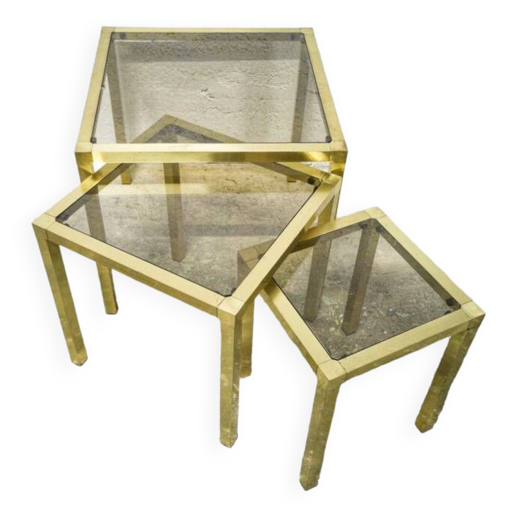 Trio of nesting tables in brass and smoked glass