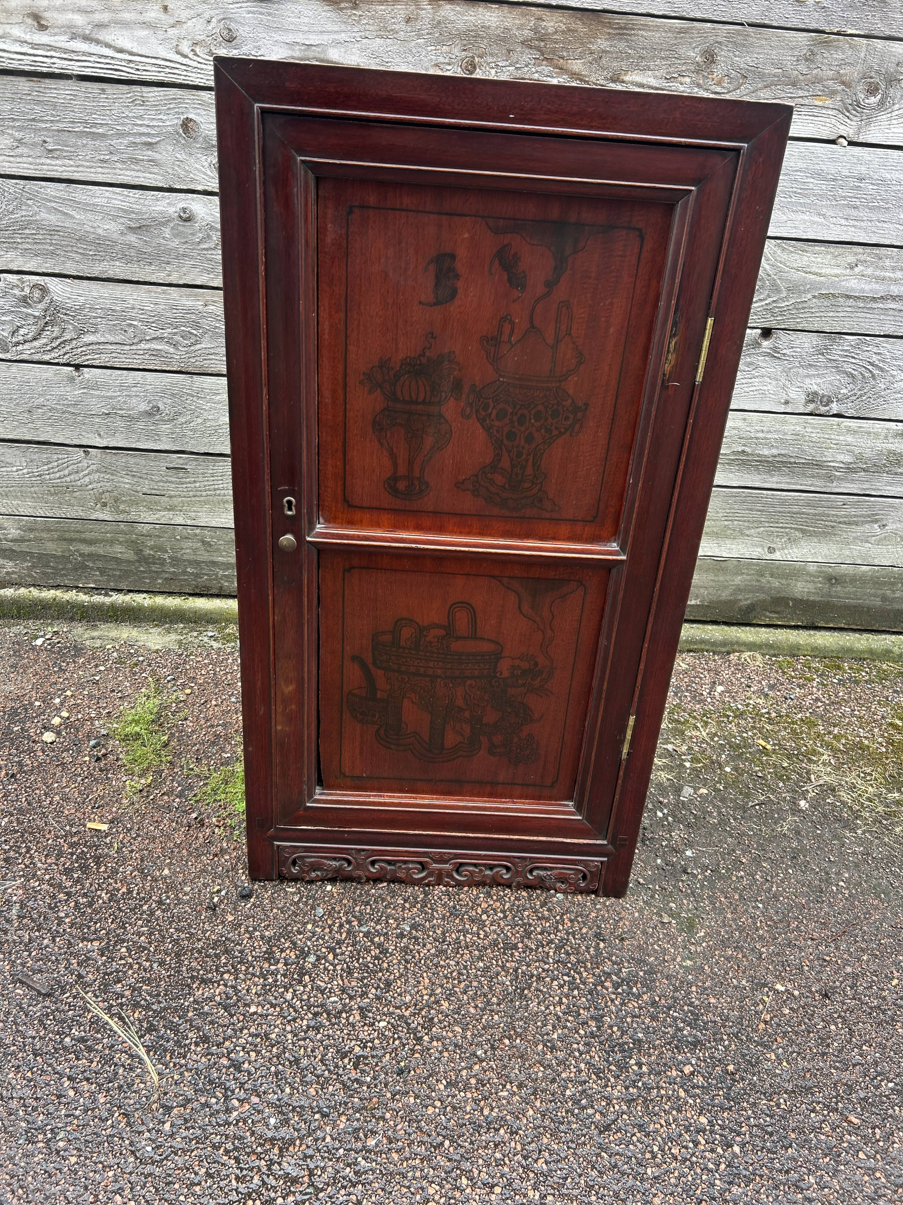 Small cabinet with one door, Indonesian.