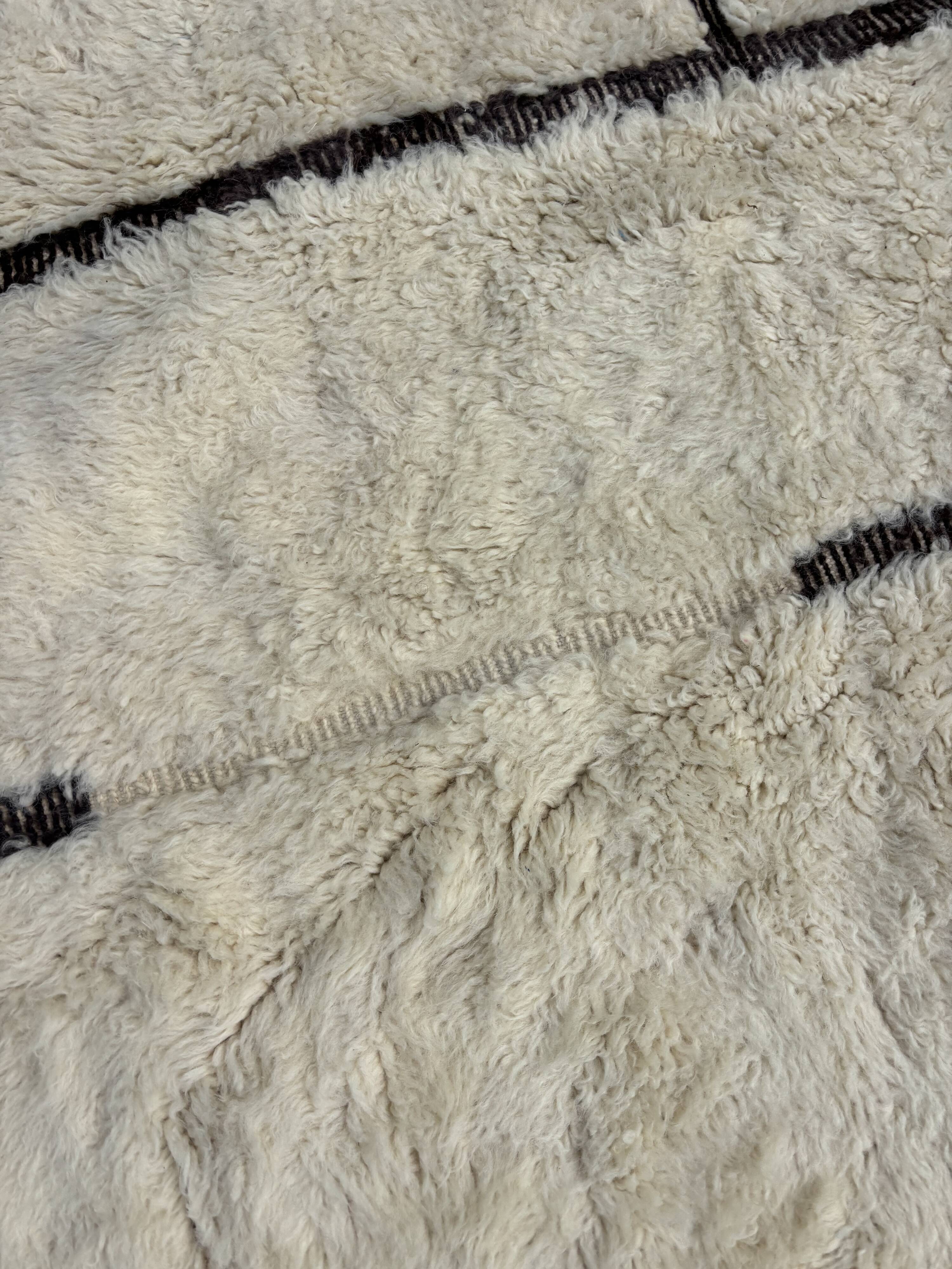 Large Berber M'rirt rug in cream and black wool, Moroccan rug.