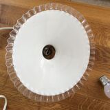 Old suspension in dented opaline