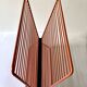 Wire metal magazine rack with triangular compartment, 1950s.