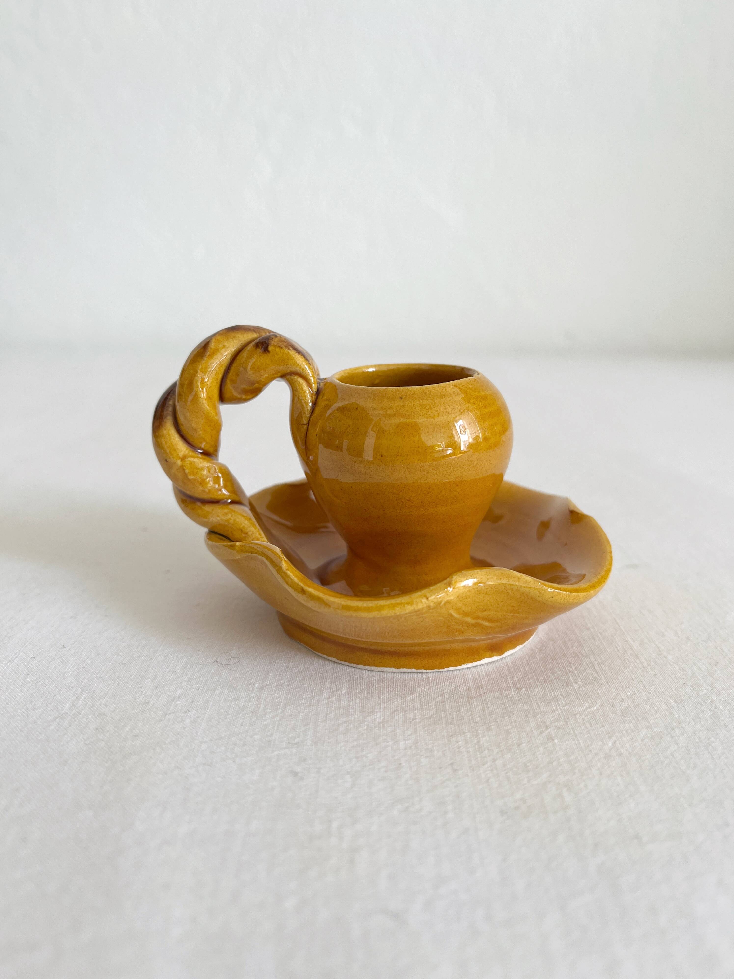 Mustard ceramic candle holder with vintage twisted handle