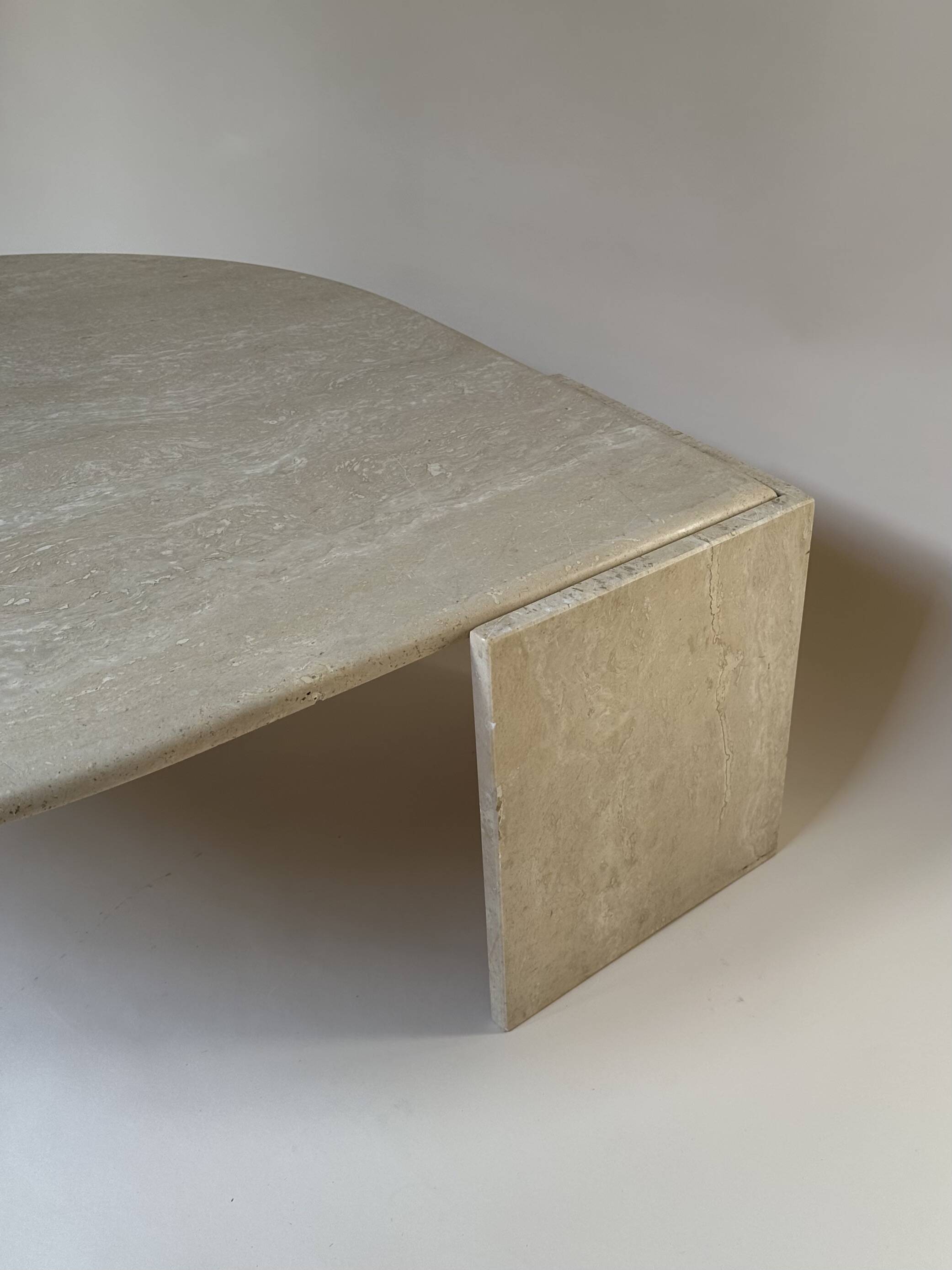 Travertine eye-shaped coffee table