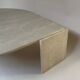 Travertine eye-shaped coffee table