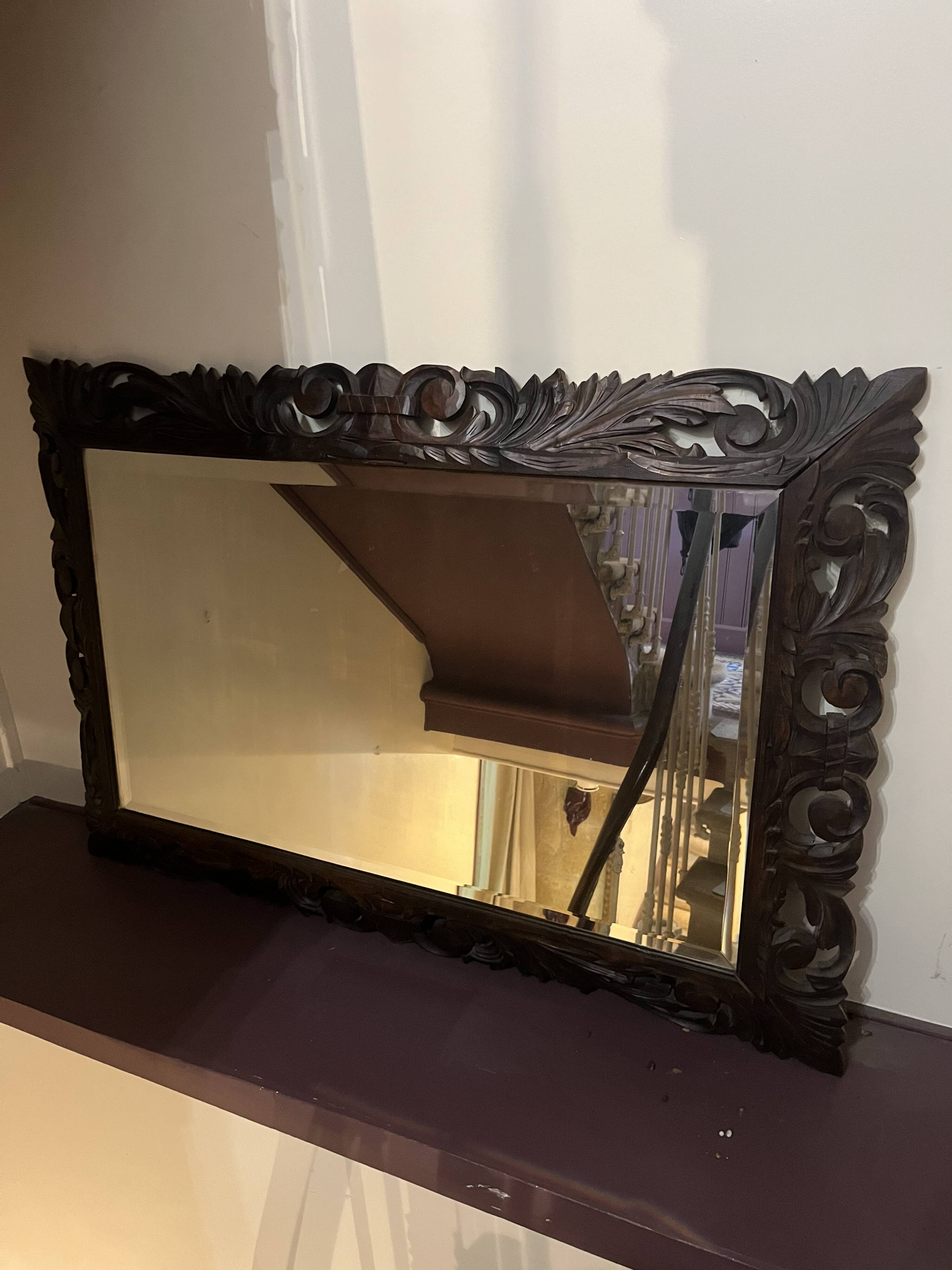 Antique mirror in carved wood