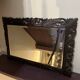 Antique mirror in carved wood